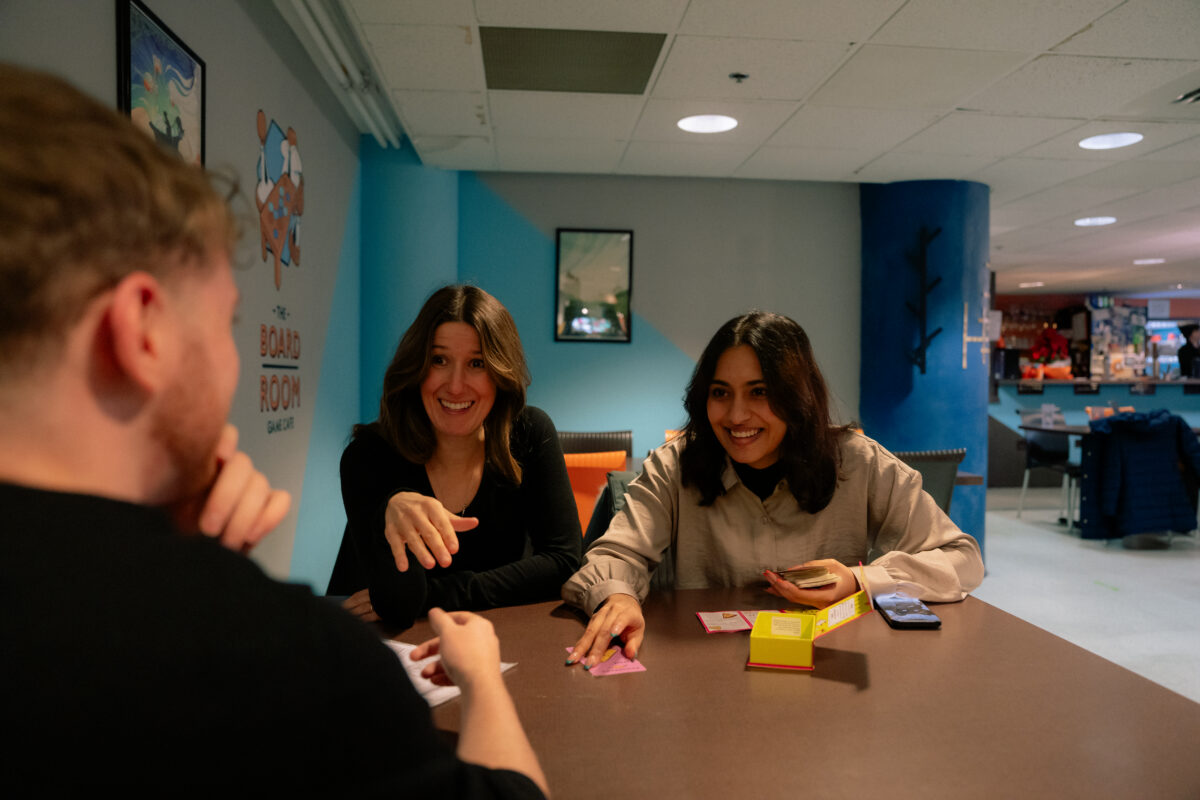 People playing card games at The Board Room Game Café in Downtown Halifax.