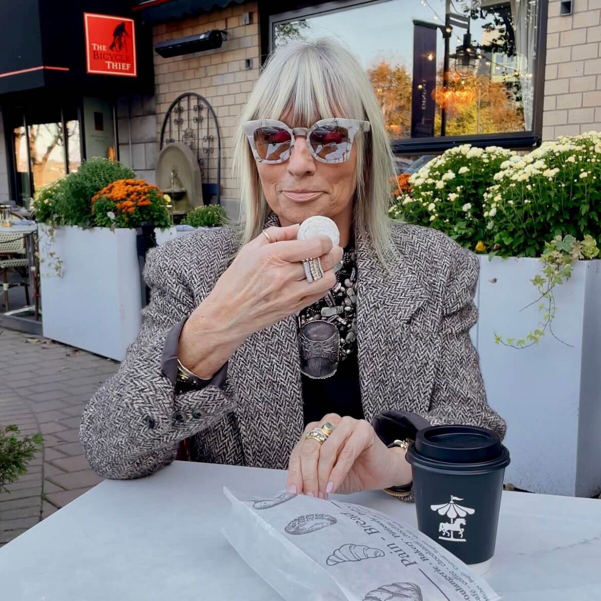 Carrie Lamb enjoying a pastry and coffee at Pane e Circo on the Halifax Waterfront.