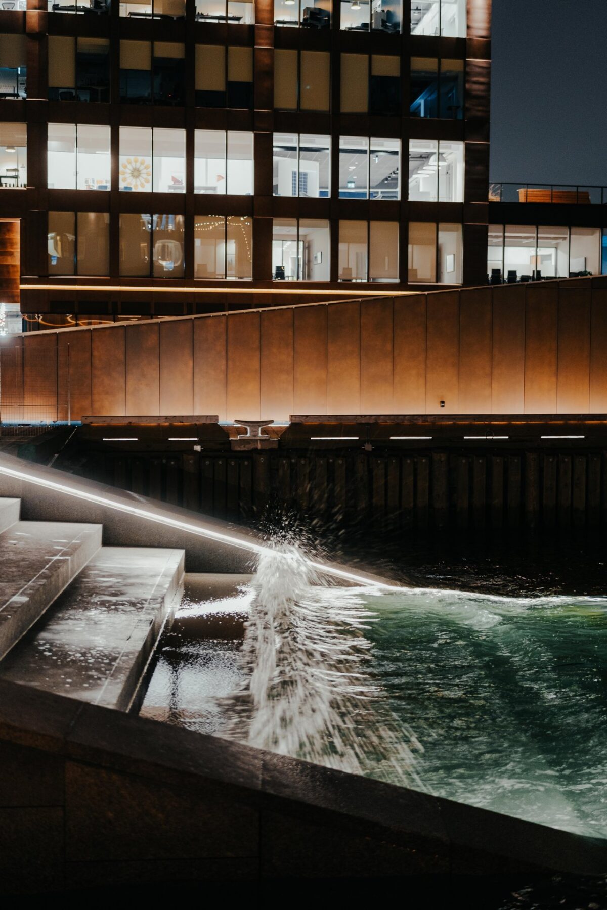 Ocean water crashing over steps at Queen’s Marque on the Halifax Waterfront.