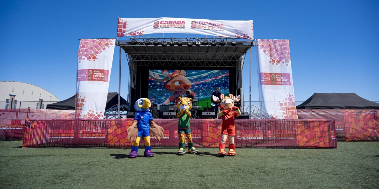 FIFA World Cup 2026™ mascots in front of the Canada Celebrates FIFA World Cup 2026 stage