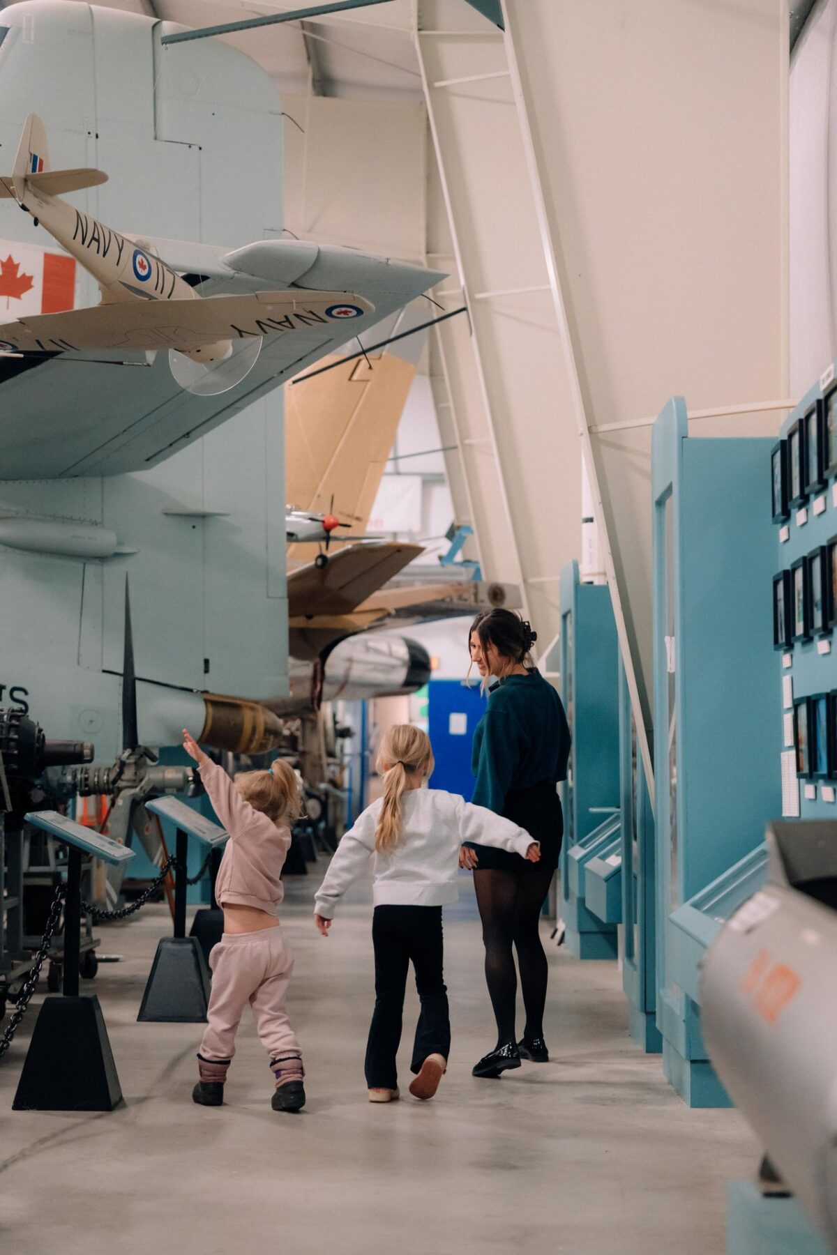 Children explore aircraft exhibits at the Atlantic Canada Aviation Museum.