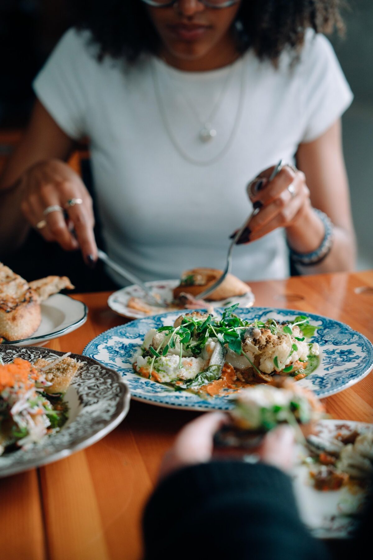 Dishes being shared at EDNA restaurant in North End Halifax.